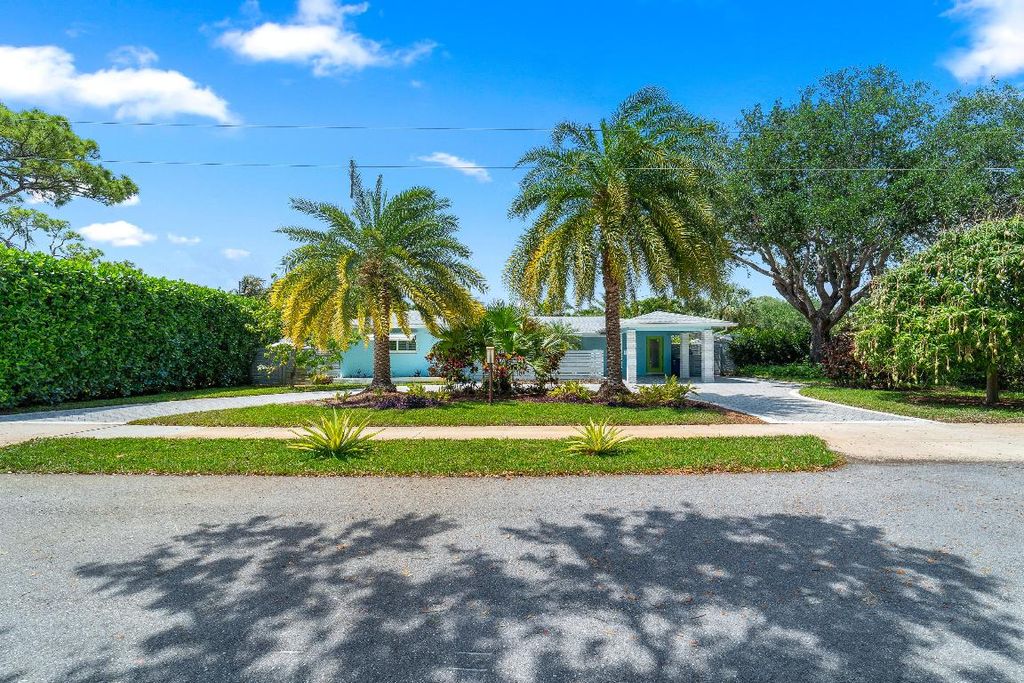 Photo of 830 Seminole Boulevard, Lake Park, FL 33403 (MLS # R11077616)