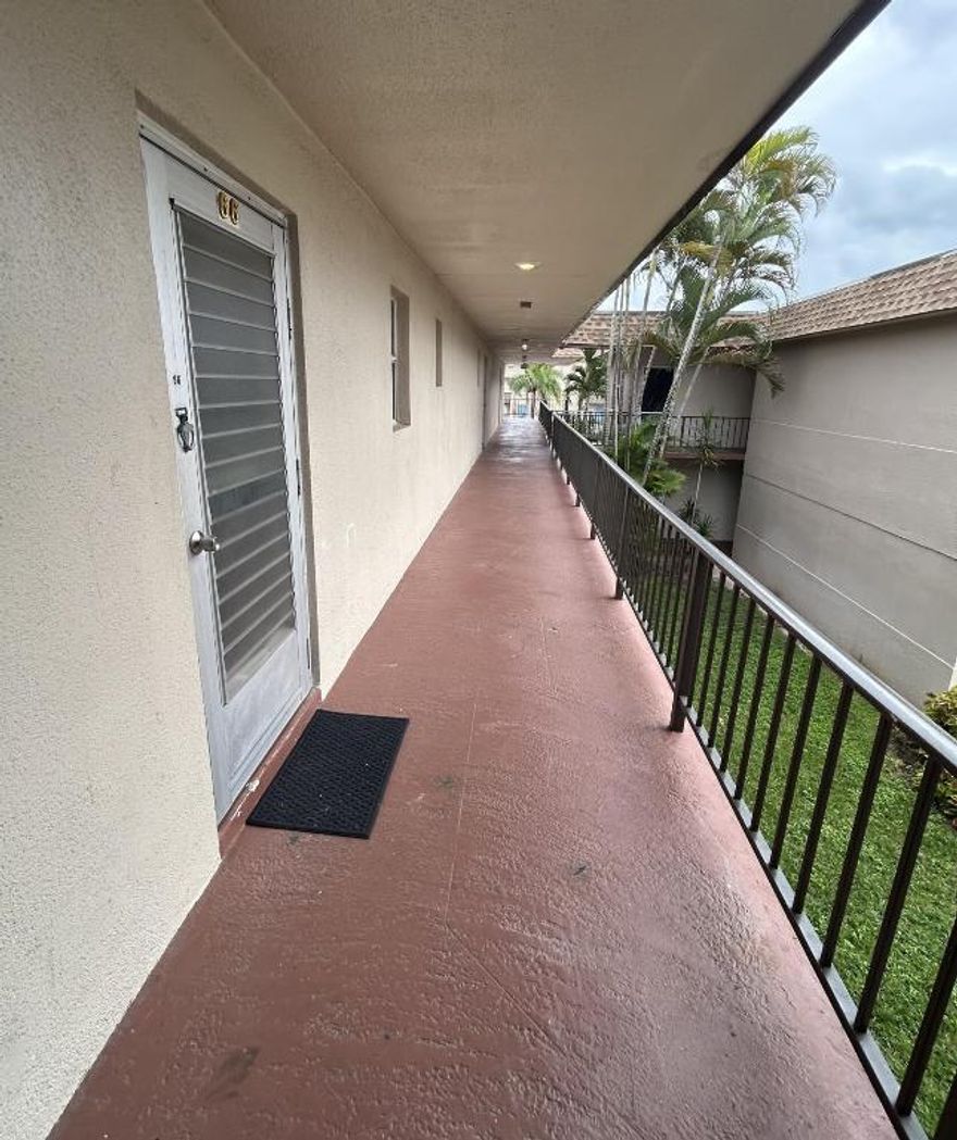 Adult 55+ community. Larger master bedroom with walk in closet. Upgraded bathroom, plus a den that could be used as a second bedroom. Tile floor throughout the whole unit. Tankless/ water heater, new A/C 2025, new roof 2025. Enjoy two pools (one heated), gym, pool tables, bowling, bocce ball, shuffleboard, minigolf, picnic area, auditorium, and courtesy bus for shopping. Basic cable and water included in HOA. Assigned parking and guest spaces. Lease ok after 2 years. The complex is located near shopping centers, restaurants and Palm Beach Airport.