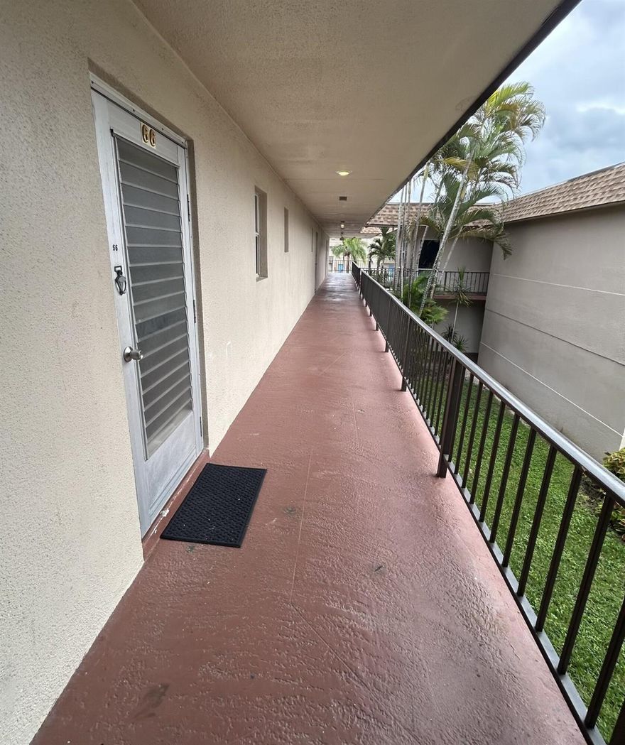 Adult 55+ community. Larger master bedroom with walk in closet. Upgraded bathroom, plus a den that could be used as a second bedroom. Tile floor throughout the whole unit. Tankless/ water heater, new A/C 2025, new roof 2025. Enjoy two pools (one heated), gym, pool tables, bowling, bocce ball, shuffleboard, minigolf, picnic area, auditorium, and courtesy bus for shopping. Basic cable and water included in HOA. Assigned parking and guest spaces. Lease ok after 2 years. The complex is located near shopping centers, restaurants and Palm Beach Airport.
