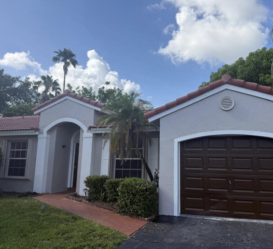 Photo of 1306 NW 125th Terrace, Sunrise, FL 33323 (MLS # B26075933)