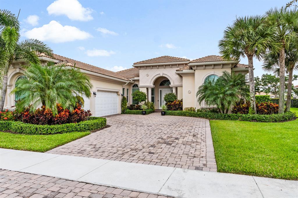 GOLF MEMBERSHIP WITH NO WAIT! Stunning oversized 4 bed/4.5 bath expanded Castania floor plan in the world class sought after Jupiter Country Club Golf Community. Single level split floor plan pool home has a summer kitchen, 3 car garage, bonus room and sits on a lakefront lot. Gourmet chefs kitchen with top notch Wolf SS appliances, granite countertops and tile backsplash. The open living floor plan offers amazing pool/lake views upon entering. Impact glass windows, doors and custom plantation shutters throughout. Spacious primary bedroom has custom built-in his & her walk in closets, spa like bathroom with dual vanities, walk in shower & jacuzzi tub. Crown molding throughout, coffered ceilings, marble tile, wood floors. Office & Living room built-in's.