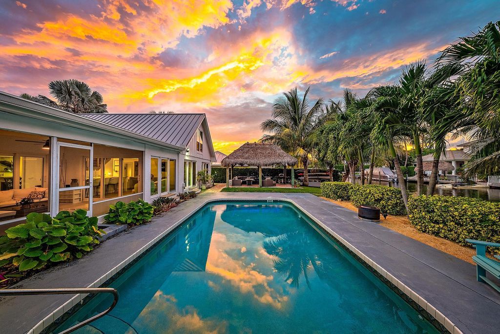 Photo of 19 Leeward Circle, Tequesta, FL 33469 (MLS # R11122151)