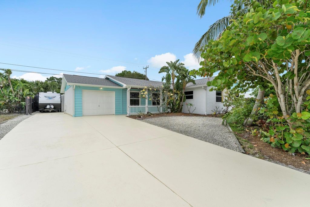 Photo of 1779 NE 23rd Terrace, Jensen Beach, FL 34957 (MLS # R10981370)