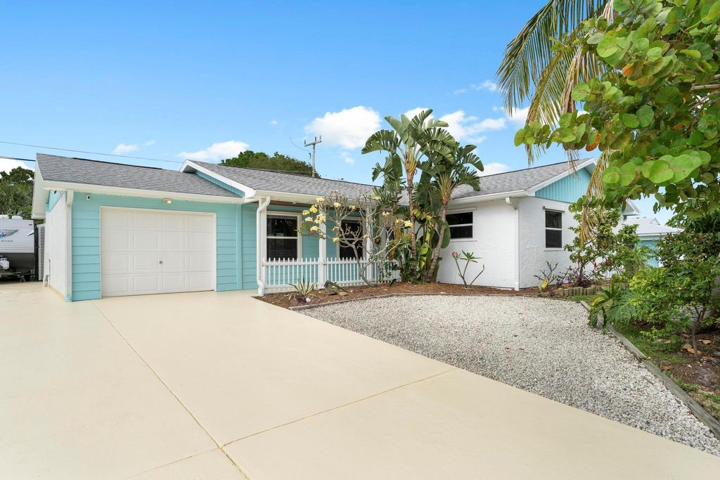 Photo of 1779 NE 23rd Terrace, Jensen Beach, FL 34957 (MLS # R10981370)