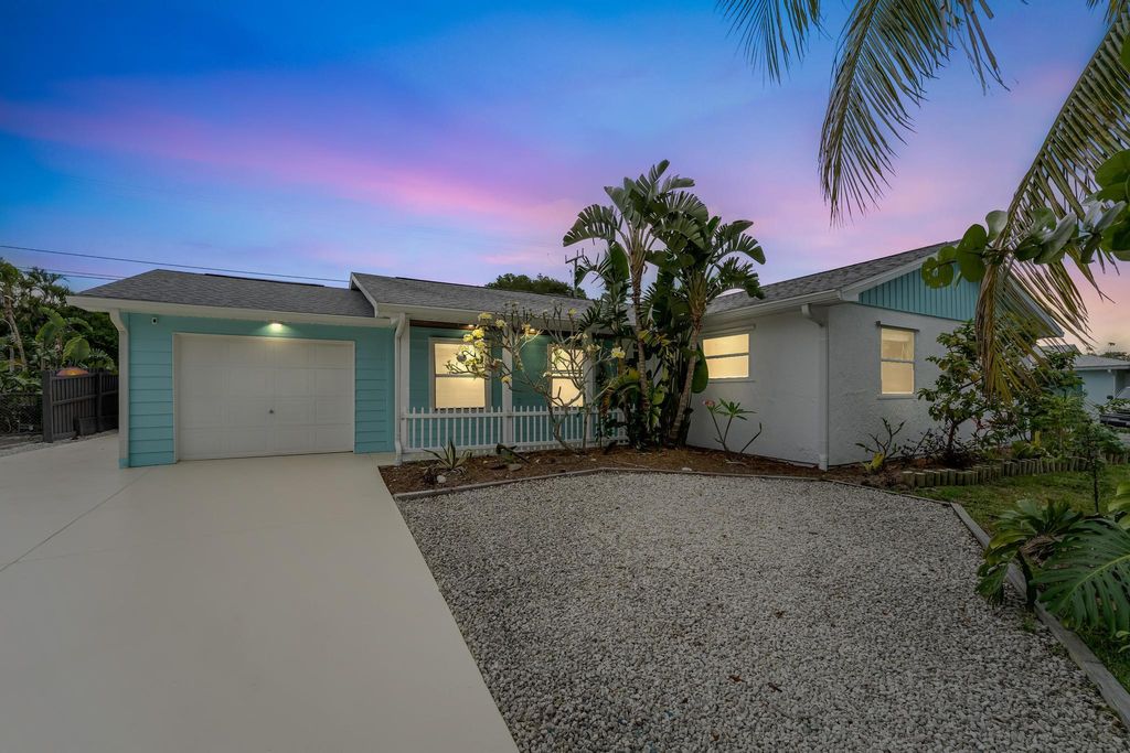 Photo of 1779 NE 23rd Terrace, Jensen Beach, FL 34957 (MLS # R10981370)