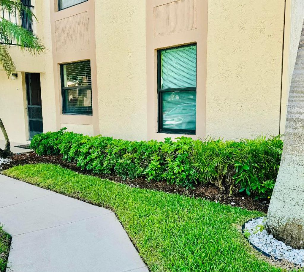 Photo of 9480 Boca Cove Cir Circle #401, Boca Raton, FL 33428 (MLS # R10924097)
