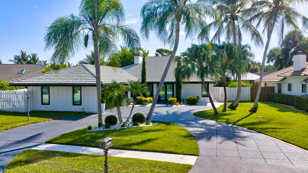 Photo of 12894 N Normandy Way, Palm Beach Gardens, FL 33410 (MLS # B26074323)