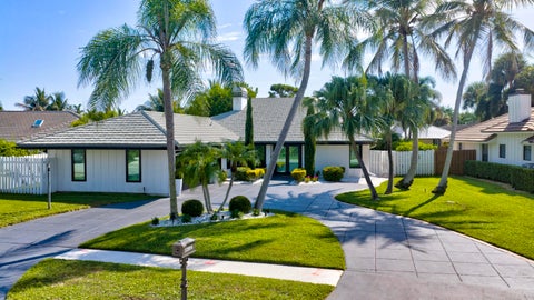 Photo of 12894 N Normandy Way, Palm Beach Gardens, FL 33410 (MLS # B26074323)