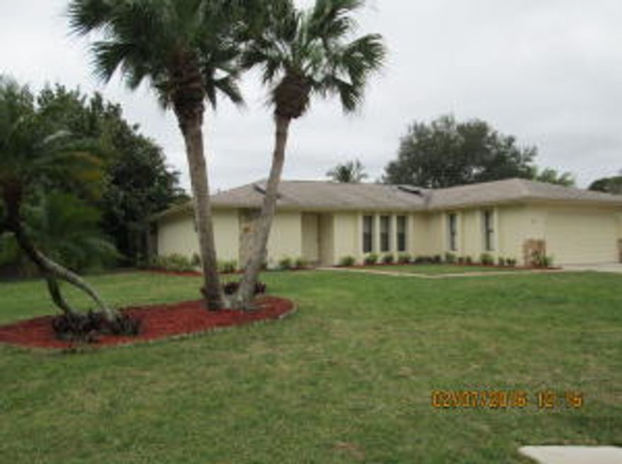 3/2/2 CBS home on quiet .34 acre corner lot with fenced yard.  The home features a large 25 x 12 screened lanai, New 2015 A/C, new roof in 2005, new Garage door opener, new light fixtures, and fresh paint in and out.  Don't let this one get away.