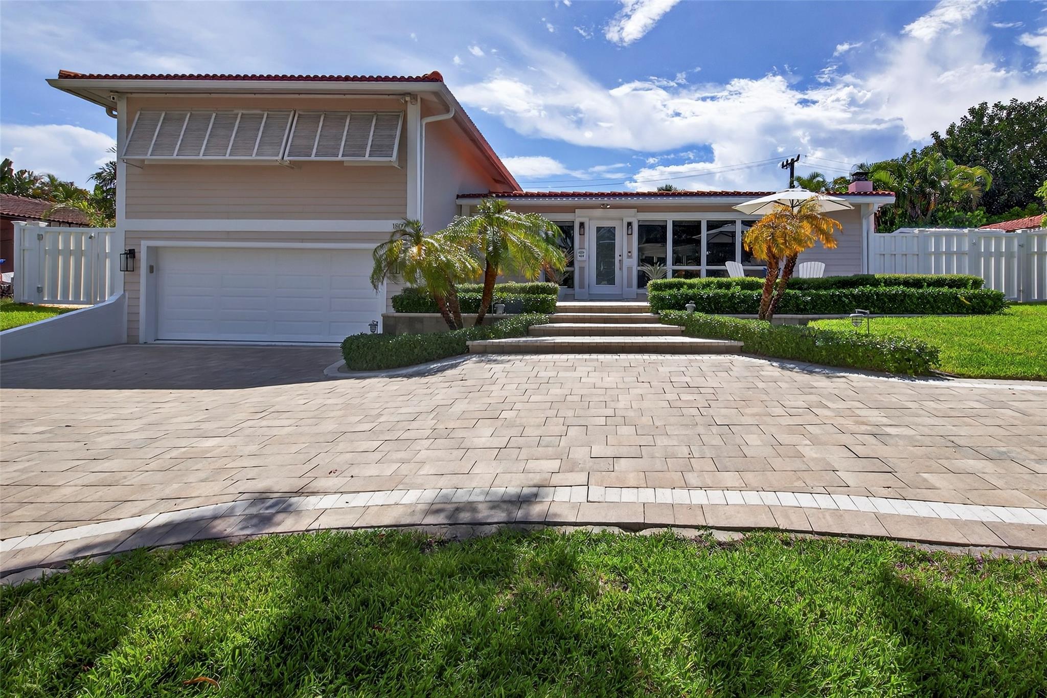 COASTAL CHIC & MODERN LUXURY COMBINE PERFECTLY IN THIS ELEVATED BEACH SIDE MINI-RESORT IN HARBOR INLET! LOADED W/ EVERY IMAGINABLE AMENITY, THIS 3 BED/3.5 BATH LEAVES NOTHING FOR THE HEART TO DESIRE! 2 BLOCKS FROM THE BEACH & THE RESORTS, MINS TO LAS OLAS & THE SIZZLE OF FT. LAUDERDALE, UPON ENTERING, YOU WILL FEEL AS IF YOU ARE ON SOME EXOTIC VACATION & NEVER WANT TO LEAVE! NEWLY RENOVATED & IN PRISTINE CONDITION, THE THOUGHT & DETAILS WILL IMPRESS ALL! OPEN, BRIGHT LIVING AREAS OFFERING MULTIPLE SPACES TO ENTERTAIN OR RELAX W/ LONG VIEWS OUT THE WALLS OF IMPACT GLASS OUT TO YOUR OWN PERSONAL COUNTRY CLUB, COMPLETE W/ SUMMER KITCHEN & DINING TABLE, PRECIOUS KEY WEST STYLE GAZEBO/FIREPIT, LOUNGE AREA W/ TV, OUTDOOR SHOWER & EVEN GOLF CART PARKING!! THE PICTURES DO NOT DO THIS ONE JUSTICE!