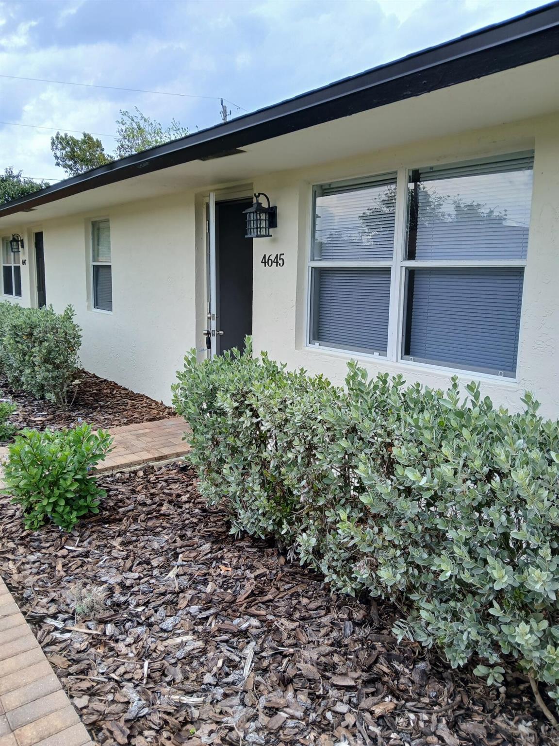 Clean and freshly painted 2-bedroom 1 bath with updated tile flooring throughout. Kitchen has been updated with new cabinets and counter top. Washer and dryer located inside the unit. Fenced in back yard and off-street parking is right outside of the unit. Centrally located to shopping, restaurants and downtown. Available right away and easy to show. This one won't last. 1st, last and security required.