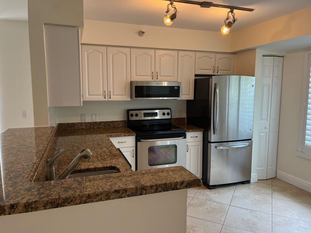 Photo of 103 Yacht Club Way #101, Hypoluxo, FL 33462 (MLS # R11149322)