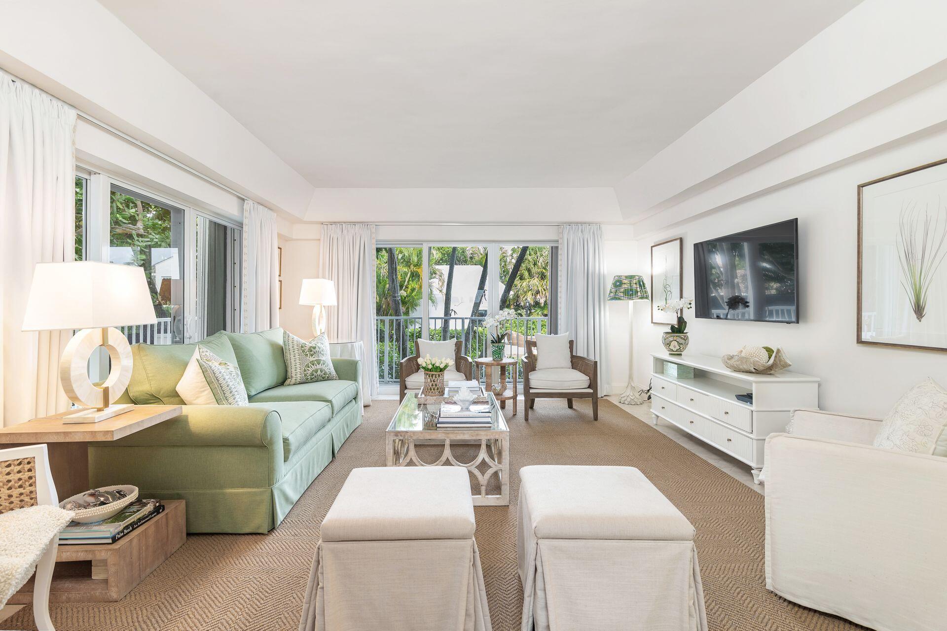 Experience the best of coastal living in this spectacular ocean front boutique building in Palm Beach. This stunning 2 bedroom, 2 bath with views of the large heated, private pool from your balcony is ideally located across the street from Mid-Town Beach and only two blocks from Worth Avenue. This first-floor turnkey end unit has tile throughout while offering a private view from each room to the pool and lush landscaping. The newly renovated lobby and hallways exude modern elegance. You are also surrounded by lush landscaping with serene outdoor seating. Residents also have access to a brand-new gym and the convenience of a doorman service building. Additionally, the Three Fifty Condo is pet friendly. The perfect Palm Beach pied-a-terre awaits, with one of the lowest HOA on the island!