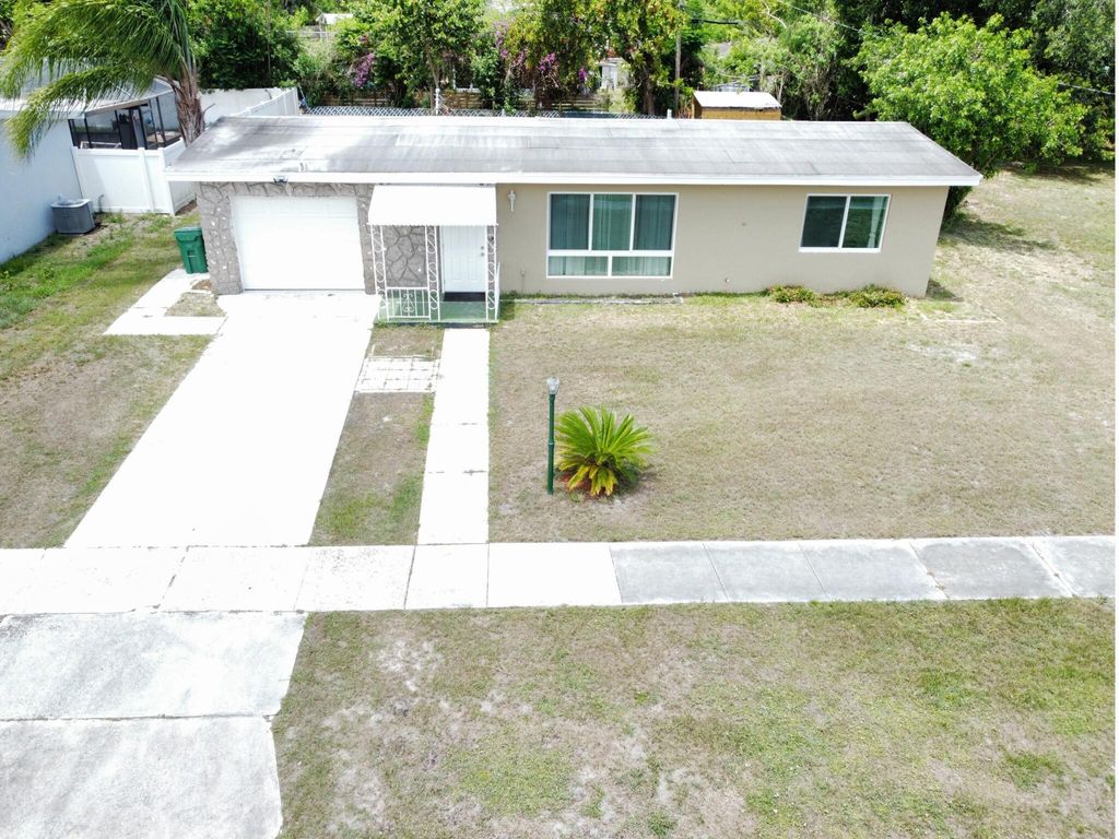 Photo of 125 SE Lucero Drive, Port Saint Lucie, FL 34983 (MLS # R10993443)