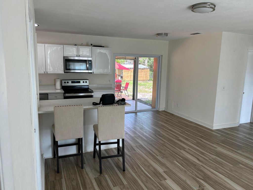 Photo of 125 SE Lucero Drive, Port Saint Lucie, FL 34983 (MLS # R10993443)