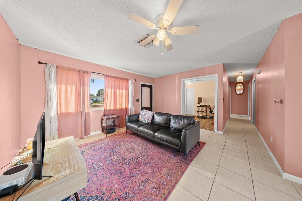 Photo of 651 SE Port St Lucie Boulevard, Port Saint Lucie, FL 34984 (MLS # R11137168)