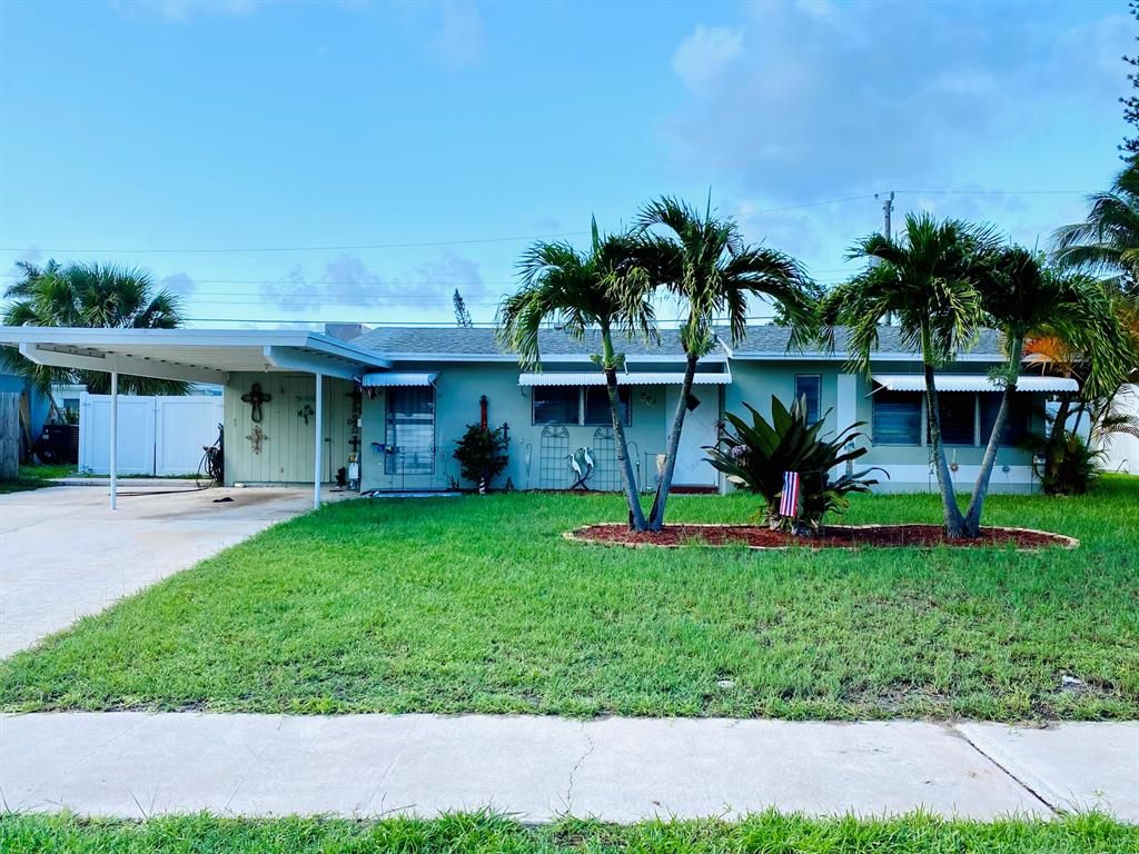 Photo of 804 Cinnamon Road, North Palm Beach, FL 33408 (MLS # R10733441)