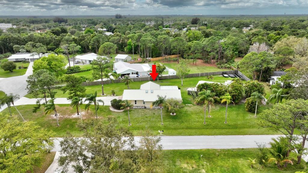 Photo of 2103 SE Meadowbrook Road, Stuart, FL 34997 (MLS # R11064000)