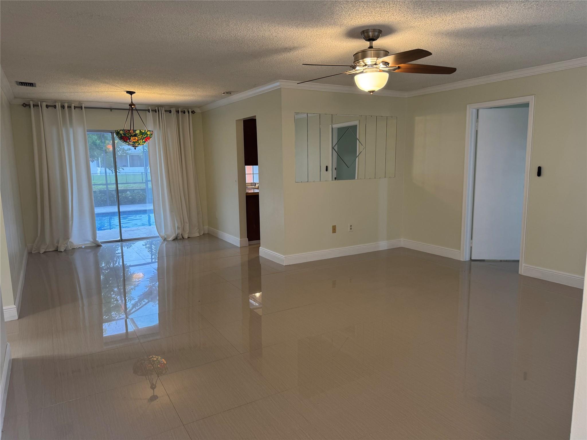 Spacious 3/2 pool home with 1 car garage in move in condition with family room and breakfast nook. The property has been freshly painted and professionally cleaned. The screen patio/pool area provides large entertainment space with water views. Rate includes lawn and pool maintenance as well as use of security cameras.