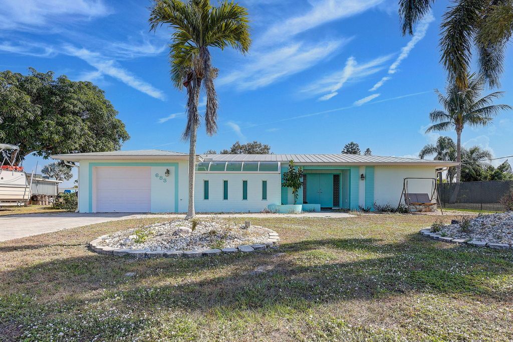 Photo of 683 SE Harborview Drive, Port Saint Lucie, FL 34983 (MLS # B26037835)