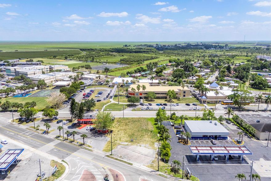Prime 0.45-Acre Property in the Heart of Downtown Pahokee - Endless Commercial Possibilities. Located in the heart of downtown Pahokee, this 0.45-acre vacant lot offers unmatched potential for a wide range of commercial developments. Its strategic location near shopping centers, gas stations, and key businesses ensures high visibility and accessibility, making it an ideal site for entrepreneurs and investors. Zoned for commercial core, residential, office, and entertainment uses, the property provides flexibility for various ventures including retail spaces, office buildings, mixed-use developments, or entertainment venues. Whether you're looking to create a bustling business hub or a vibrant community center, this property offers endless possibilities for growth and success.