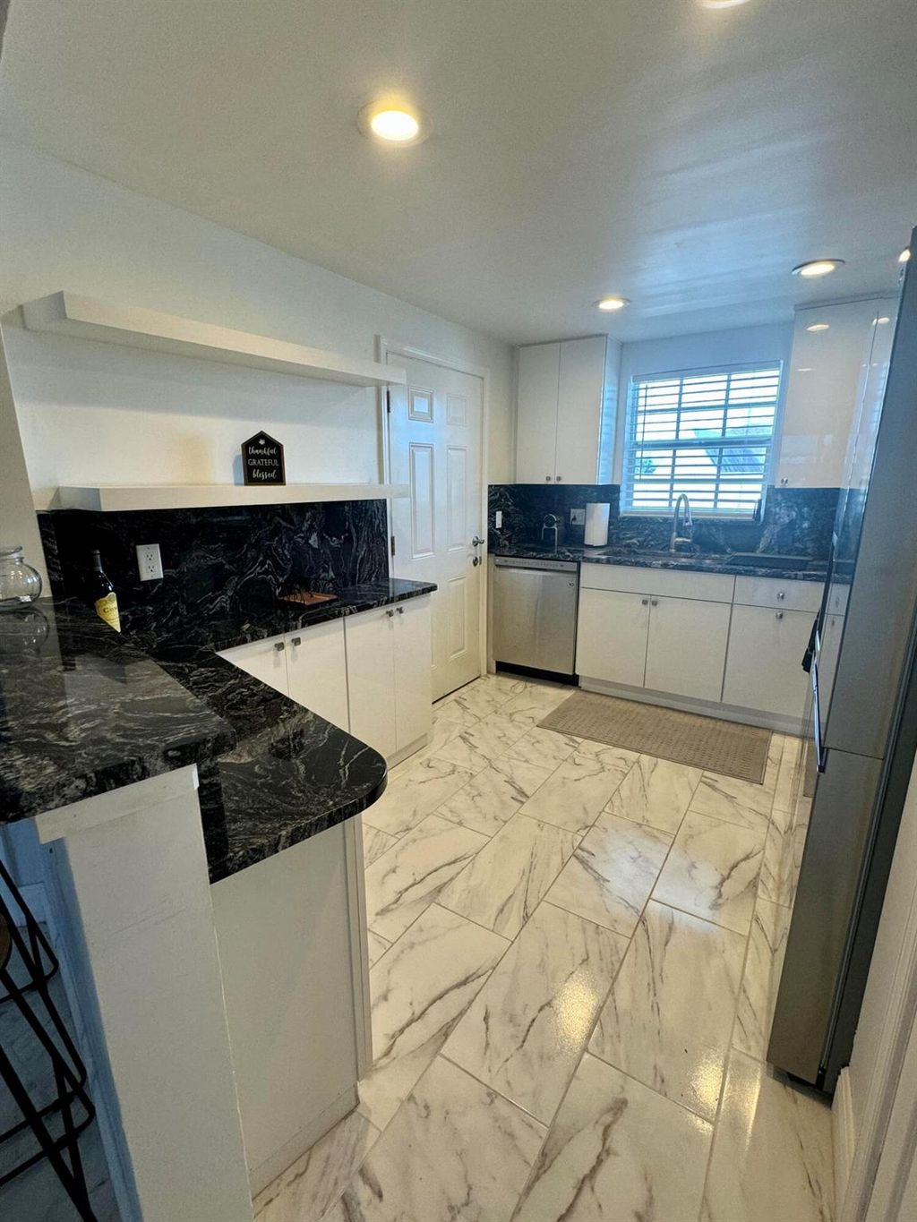 Photo of 907 Marina Dr #409, North Palm Beach, FL 33408 (MLS # R11031648)