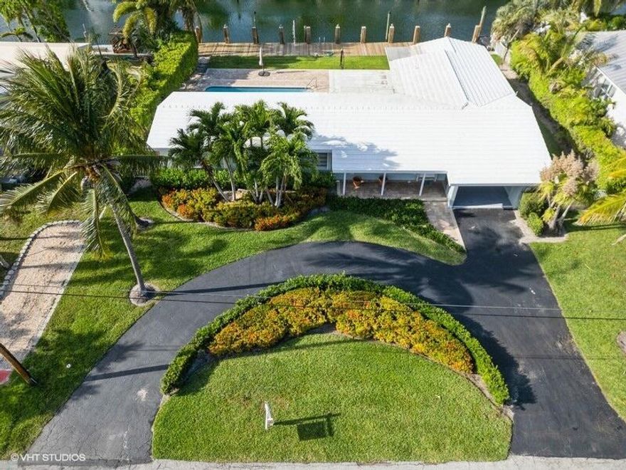 Boasting 100 feet of waterfront, this exceptional Lighthouse Point rental is a boater's dream...perfect for large vessels with no fixed bridges and quick access to the inlet. Enjoy unobstructed Intracoastal views from the front of the home, while the private backyard oasis features a spacious pool ideal for relaxing or entertaining. The updated kitchen adds modern appeal, with new photos coming soon. Ideally located near top dining, shopping, and everything South Florida has to offer. A rare opportunity to live the ultimate waterfront lifestyle in one of the area's most sought-after boating communities!