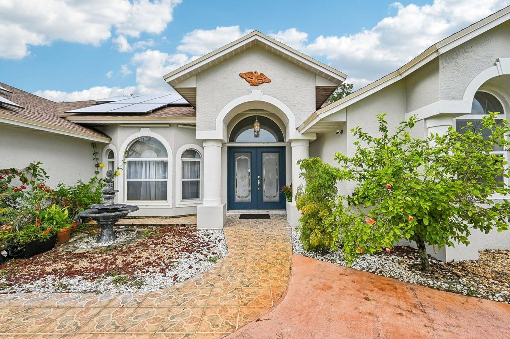 Photo of 2041 SW Villanova Road, Port Saint Lucie, FL 34953 (MLS # F10515318)