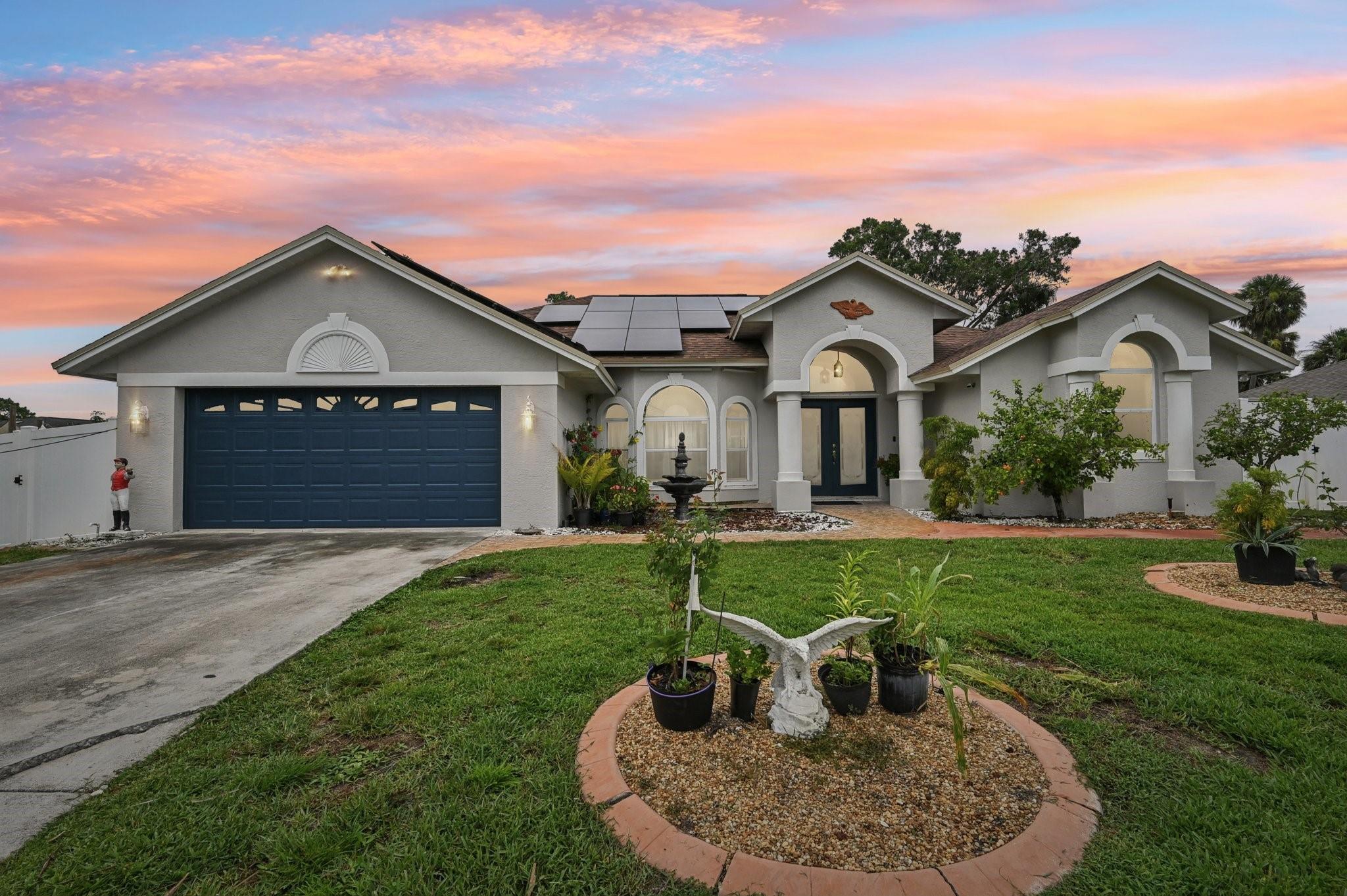Discover comfort and convenience in this spacious home complete with a newer roof and 6' vinyl fence (2023), plus the energy efficiency of solar panels. Inside find separate dining, living, and family rooms, offering versatile spaces for every need. The converted garage adds even more flexibility. Architectural archways lead to the spacious kitchen, featuring a center island and stainless steel appliances. The split bedroom layout ensures privacy, the primary bedroom offers a large closet and en-suite bathroom. A dedicated laundry room is complete with a full-size washer, dryer, and laundry tub. The private pool and screened patio provides the perfect oasis for relaxing or entertaining. Steps away from Oak Hammock Park boat ramp, fishing pier, playground & more. Don't miss out on this one!