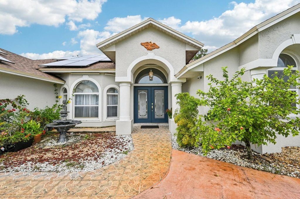 Photo of 2041 SW Villanova Road, Port Saint Lucie, FL 34953 (MLS # F10515318)