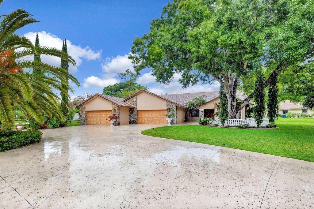 Photo of 5355 NW 77th Terrace, Coral Springs, FL 33067 (MLS # F10496807)