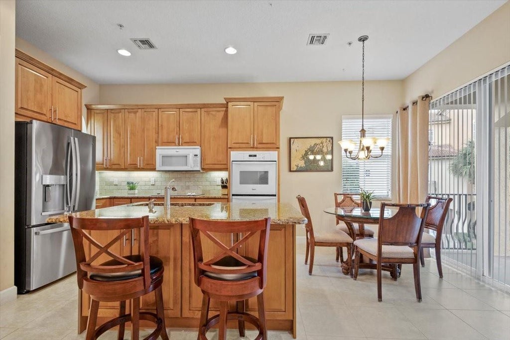 Photo of 151 Ocean Bay Drive #151, Jensen Beach, FL 34957 (MLS # F10409784)