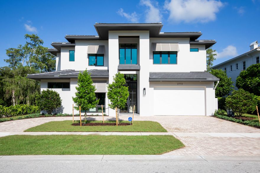 New construction completed and ready to move in.  Located on the golf course in the new community of Blue cypress within the private gates of Palm Beach Polo, this new construction luxury home features over 3,700 sq. ft. of living space with four bedrooms, four full and one-half bathrooms, two-car garage and a spacious outdoor living area with a pool and spa. Professionally designed and fully outfitted by Soco Interiors, this gorgeous home is offered fully furnished. The elegant, contemporary design balances modern minimalism with subtle farmhouse muse, creating peaceful, bespoke spaces. The main floor hosts the exquisite owner's suite, a private study and a great room with vaulted, open beam ceilings, wet bar and fireplace.