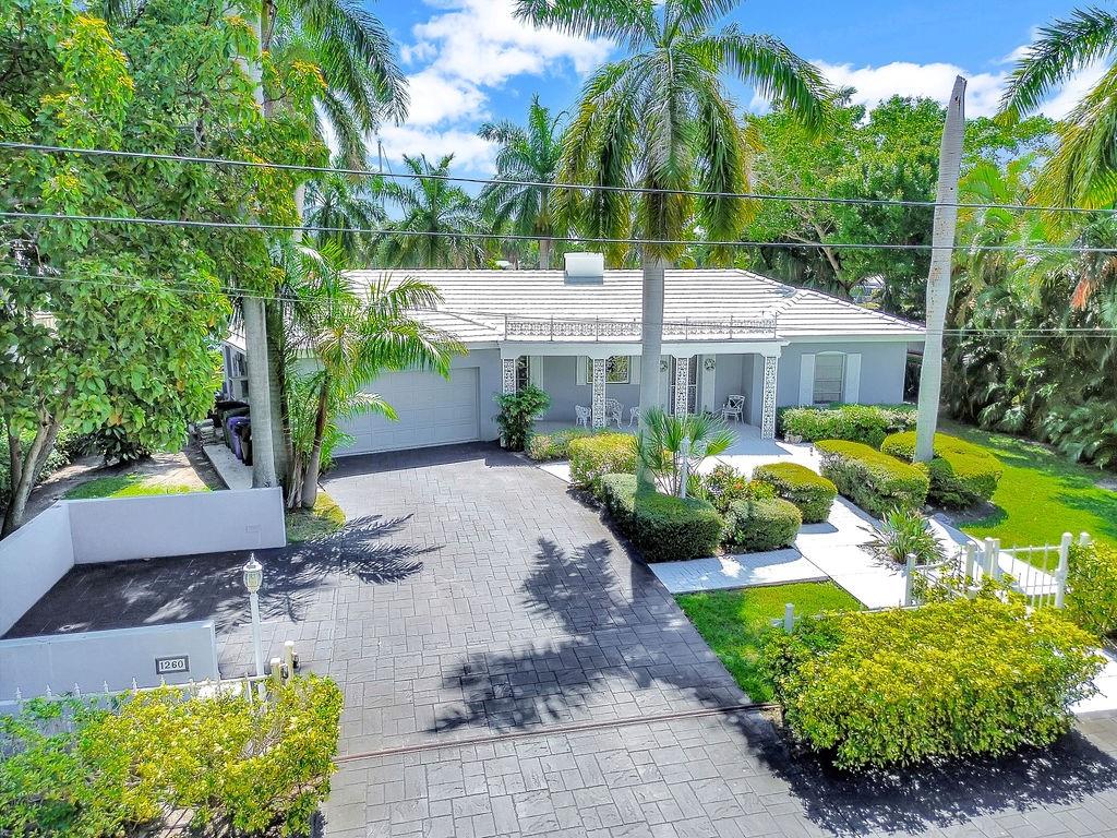 Update, build a new home, or just dock your yacht. Enjoy the beautiful and extended views down the New River from this 3 BD/2Bath home located on a large lot and close to I-95, downtown, beaches, and Las Olas shops and restaurants. One of the best properties in the Shady Banks quiet neighborhood with a Southern exposure, this home features a large patio from which one can enjoy the serenity and privacy of being right on the New River as well as a nice breeze coming from the ocean. Approximately 108’ of waterfront allows dockage for a large yacht.