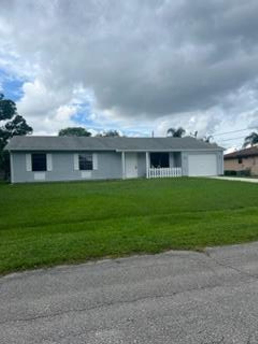 Photo of 2556 SE Hallahan Street, Port Saint Lucie, FL 34952 (MLS # R10983636)