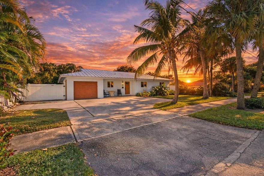 Welcome to 720 Prosperity Farms Road, located in the very sought-after Village of North Palm Beach--a rare opportunity to own in one of South Florida's most desirable communities with no HOA and access to a private community boat ramp. This move-in-ready single-family home features over $100,000 in recent upgrades, including a 2021 roof, 2025 full-impact windows and hurricane protection, 2018 AC system, 2022 water heater, and 2024 luxury vinyl flooring throughout the main living areas and bedrooms.The bathrooms were tastefully updated in 2024, and additional improvements include baseboards, crown molding, new light fixtures, ceiling fans, custom window treatments (2025), a 2024 refrigerator, newer dishwasher, and a full size laundry room. Fresh landscaping (2025) adds to the curb appeal