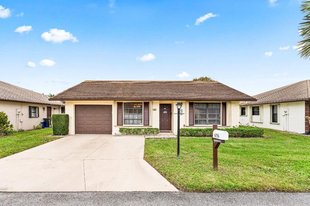 Photo of 6256 Red Cedar Circle, Greenacres, FL 33463 (MLS # R11154896)