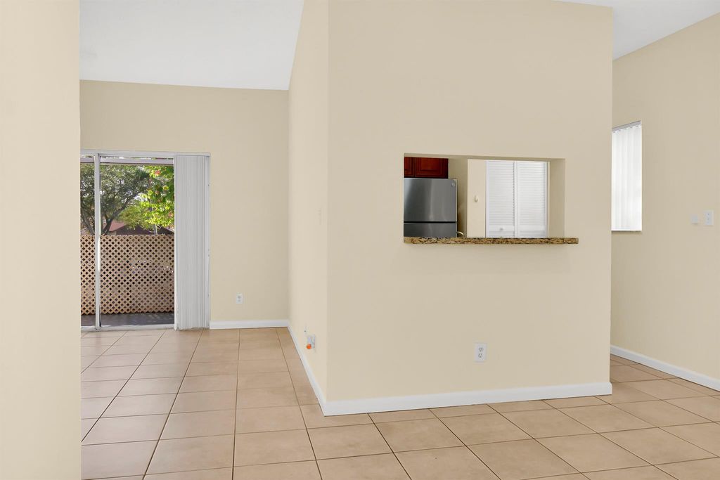 Photo of 671 Cypress Lake Boulevard #D21, Deerfield Beach, FL 33064 (MLS # R11145611)