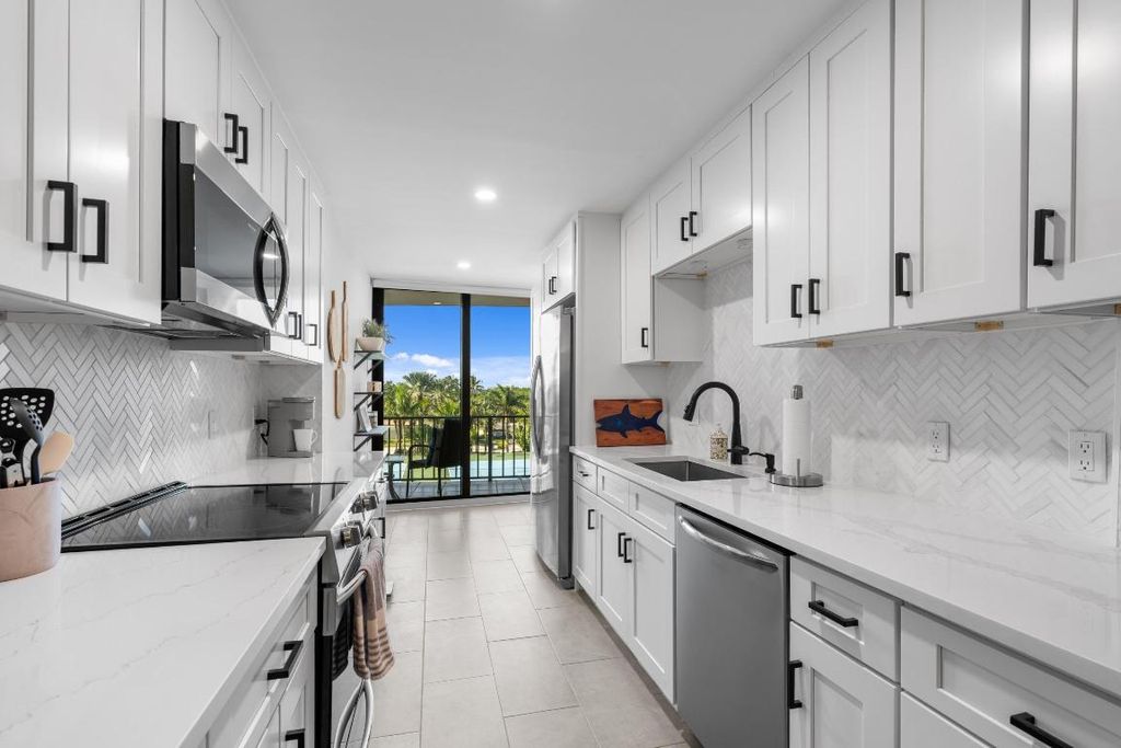 Photo of 4200 N Ocean Dr #2-304, Singer Island, FL 33404 (MLS # R11142208)