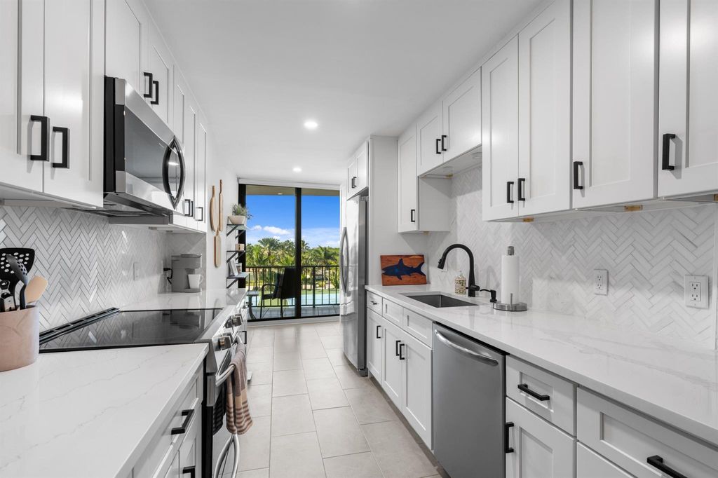 Photo of 4200 N Ocean Dr #2-304, Singer Island, FL 33404 (MLS # R11142208)