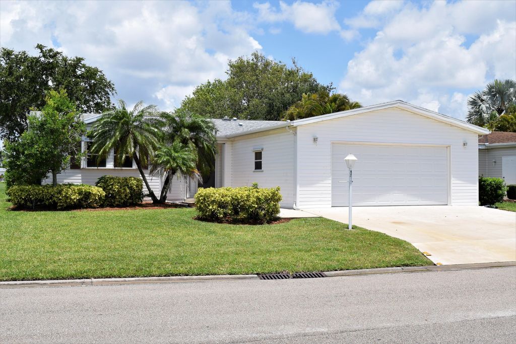 Photo of 3413 Crabapple Drive Dr, Port Saint Lucie, FL 34952 (MLS # R10807857)