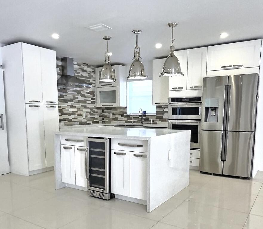 Stunningly remodeled 4 bedroom 2 bath single family home in a prime neighborhood! Modern open floor plan, stylish kitchen and baths, and spacious living areas. Hurricane impact doors and windows for peace of mind. Step outside to a private pool perfect for relaxing or entertaining. No HOA and ready for a fast move-in! Ideally located near shopping, dining, and top schools, this rental combines comfort, style, and convenience. Don't miss the opportunity to make this beautifully updated rental your next home!