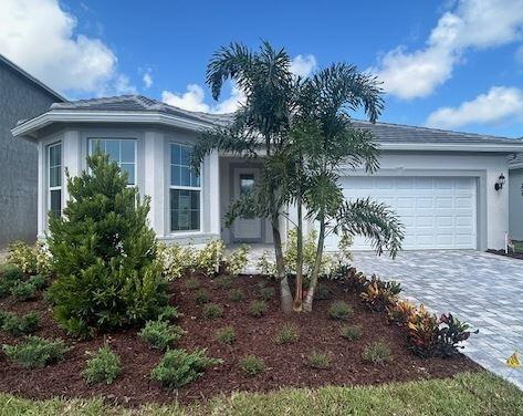 NEW CONSTRUCTION: Special Builder's Financing Program Available to help you save BIG! This popular Prestige plan has been adorned with on-trend fresh design finishes making move in a breeze no matter your decorating style. Enjoy relaxing on your oversized screened lanai overlooking your private yard space. Inside, oversized tiles flow seamlessly though the open concept space. Split bedrooms make this plan comfortable and private for everyone in the home. Whether this is your winter getaway or your full time address - the Prestige is sure to please! Take a quick stroll to the Amenity campus or down the walking path leading to the intracoastal.