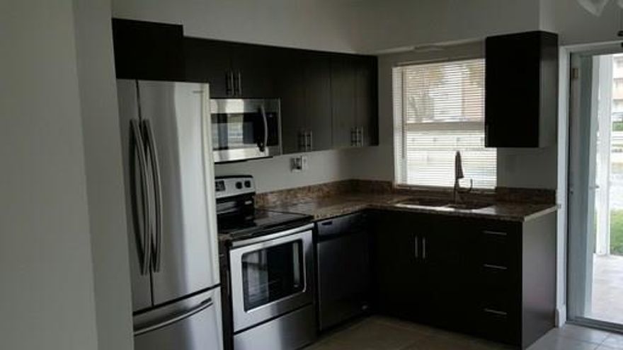 BEAUTIFUL SPACIOUS 2 BEDROOM 2 BATHROOM APARTMENT, BRIGHT AND AIRY, WITH BRAND NEW EUROPEAN STYLE KITCHEN, STAINLESS STEEL APPLIANCES, BEAUTIFUL BRAND NEW BATHROOMS, WALK IN CLOSETS, LARGE MASTER BEDROOM, TILE FLOORS THROUGHOUT, SCREENED BALCONY, HUGE COMMUNITY POOL, CLOSE TO LAUDERHILL CITY HALL, GREAT SHOPPING AND TRANSPORTATION. MOVE IN READY!!! FAST APPROVALS AVAILABLE!! SECTION 8 WELCOME