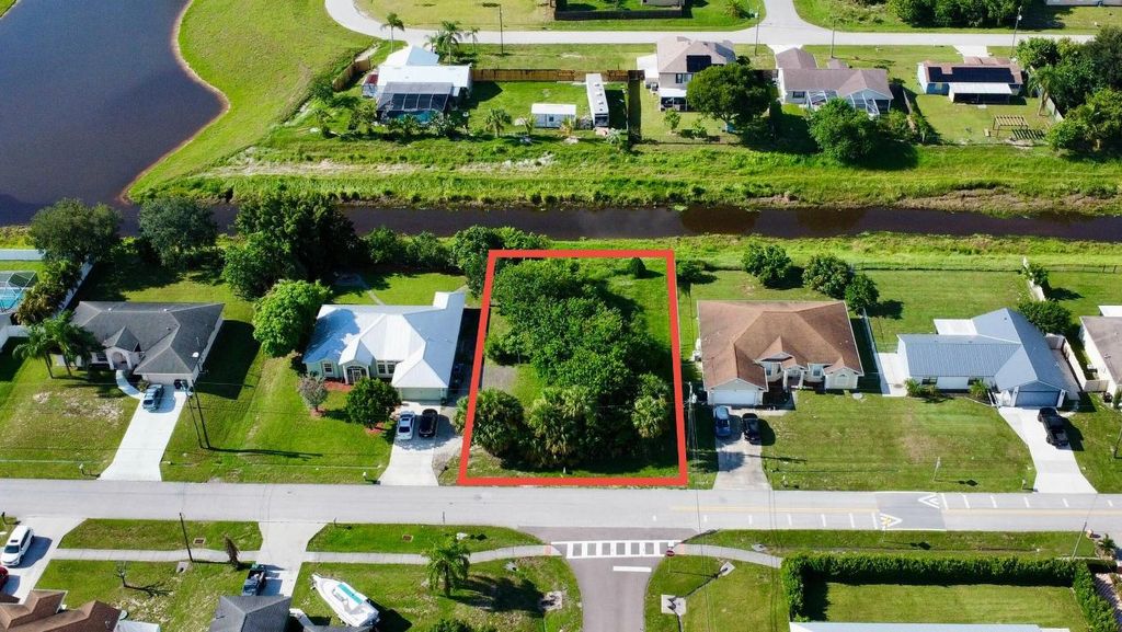 Photo of 891 SW Idol Avenue, Port Saint Lucie, FL 34953 (MLS # R11092025)
