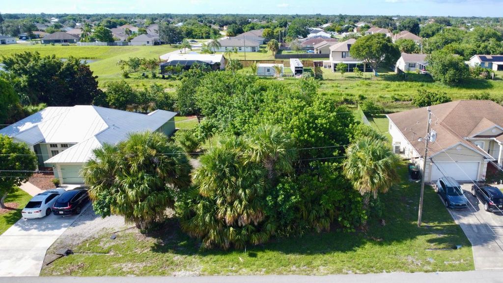Photo of 891 SW Idol Avenue, Port Saint Lucie, FL 34953 (MLS # R11092025)