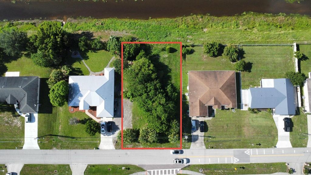 Photo of 891 SW Idol Avenue, Port Saint Lucie, FL 34953 (MLS # R11092025)