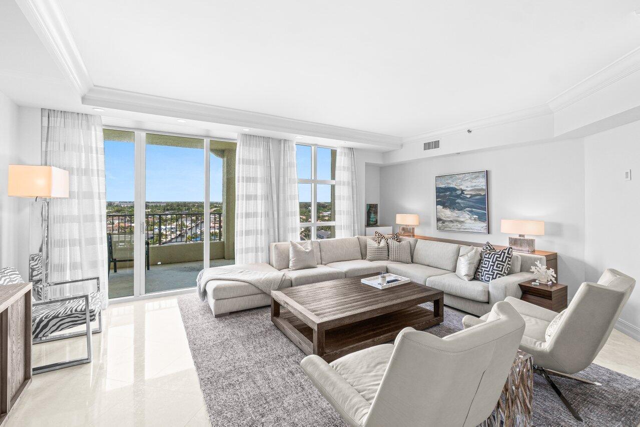 OCEAN, INTRACOASTAL, CITY & THE GRAND PIAZZA BELOW WITH AMAZING VIEWS IN EVERY DIRECTION! 5 ACRES OF LUSHLY MANICURED LANDSCAPING, SPARLING FOUNTAINS, 3 HEATED POOLS, SPA HOT TUBS, TENNIS COURTS, BRICK PAVED WALKWAYS & BLOSSOMED TRELLISES THAT ILLUMINATE AT NIGHT WITH RESORT STYLE LIGHTING! THIS SUN FILLED APARTMENT FEATURES 9 FT CEILINGS, A SPLIT BEDROOM PLAN, FLOOR TO CEILING IMPACT SLIDERS, TWO PRIVATE BALCONIES, AN EN SUITE GUEST BEDROOM, MARBLE FLOORS, WALK IN CLOSETS, CUSTOM DRAPES, SOFFITED LIGHTING & IMMACULATE MOVE IN CONDITION! TOSCANA OFFERS A PRIVATE BEACH CLUB ON THE SAND, BBQ AREA, VALET SERVICES, 24 HOUR MANNED GATE & CONCIERGE, CARD ROOMS, FITNESS, BILLARDS, SOCIAL ACTIVITIES & PARTIES! LOCATED IN PRESTIGIOUS HIGHLAND BEACH BETWEEN THE OCEAN THE INTRACOASTAL WATERWAYS!