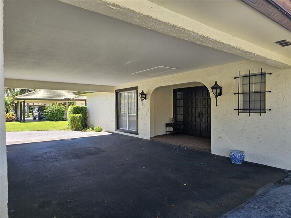 Photo of 429 Pine Villa Drive #429, Atlantis, FL 33462 (MLS # R10997239)