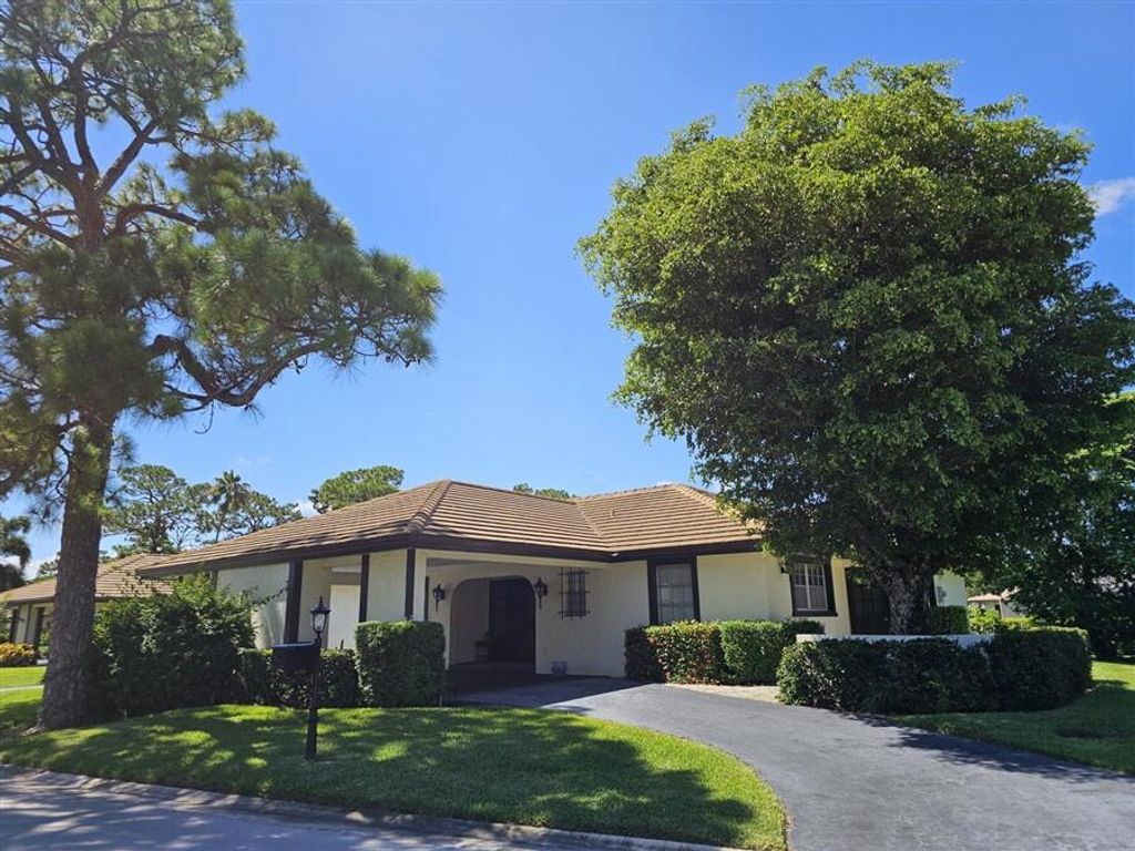 Photo of 429 Pine Villa Drive #429, Atlantis, FL 33462 (MLS # R10997239)